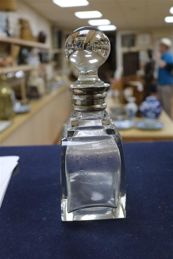 A 1930s Art Deco silver collared glass decanter and stopper, Adie Bros., Birmingham, 1939, 23cm.
